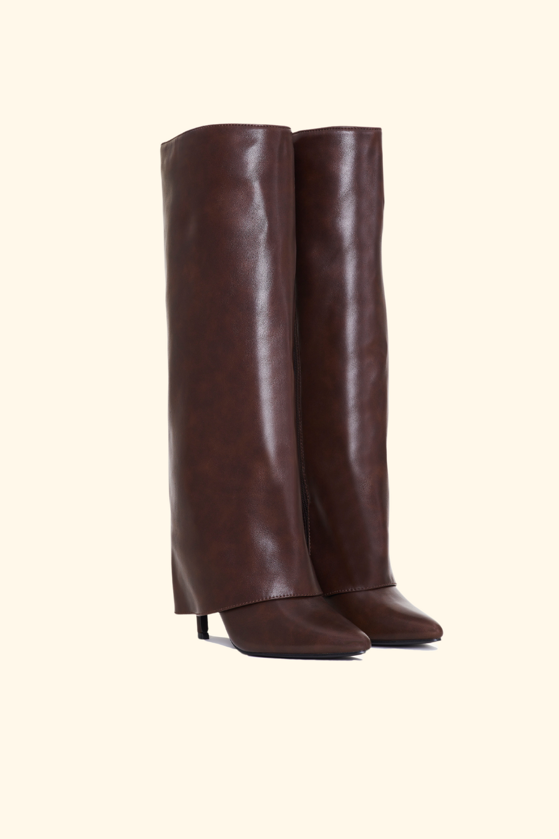 Brown folded boots with a thin heel