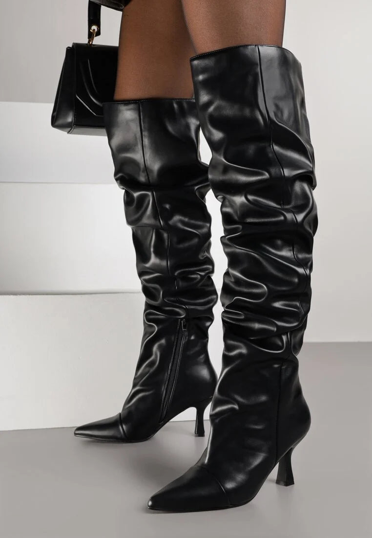 Black high boots with a thin heel