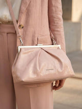 Pink torba s metalnim detaljima