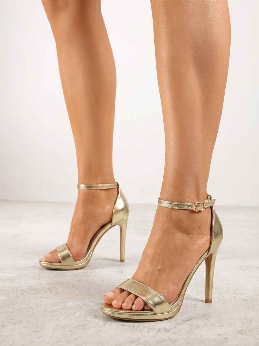 Zlatne sandale na tanku petu