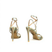 Gold sandals on a thin heel