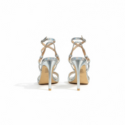 Silver sandals on a thin heel