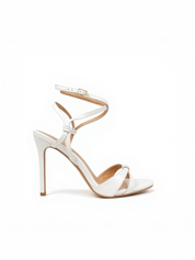White sandals with a thin heel