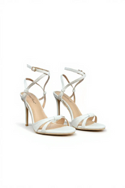 White sandals with a thin heel