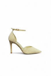 Gold heels on a thin heel