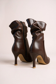 Brown ankle boots with a thin heel