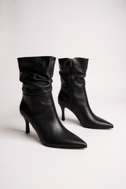 Black ankle boots with a thin heel