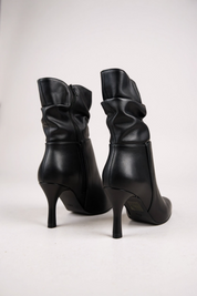 Black ankle boots with a thin heel