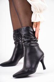 Black ankle boots with a thin heel