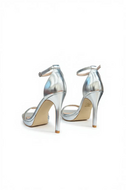 Silver sandals on a thin heel