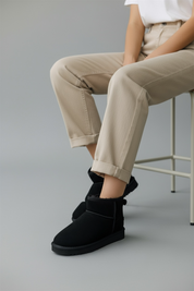 Black warm ankle boots made of genuine leather 