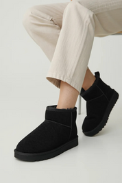 Black warm ankle boots made of genuine leather 