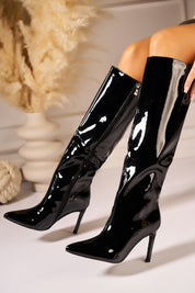 Black lacquered boots with a thin heel