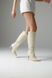 Beige boots on a thin heel
