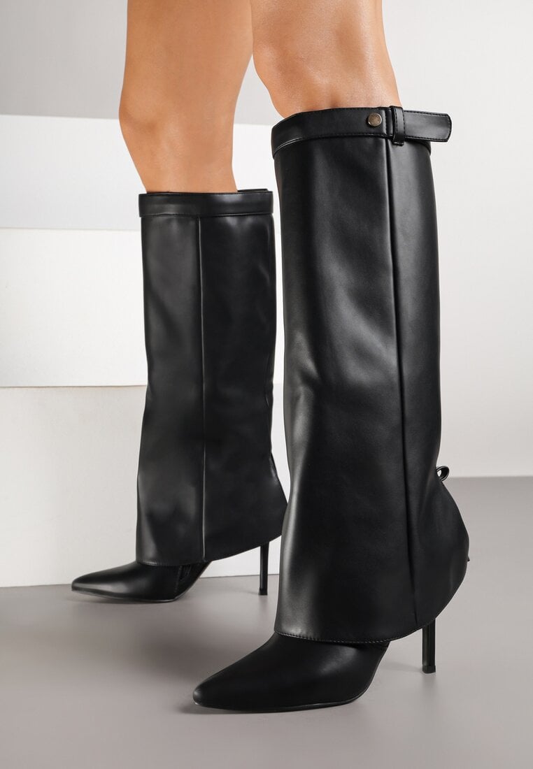 Black folded boots on a thin heel