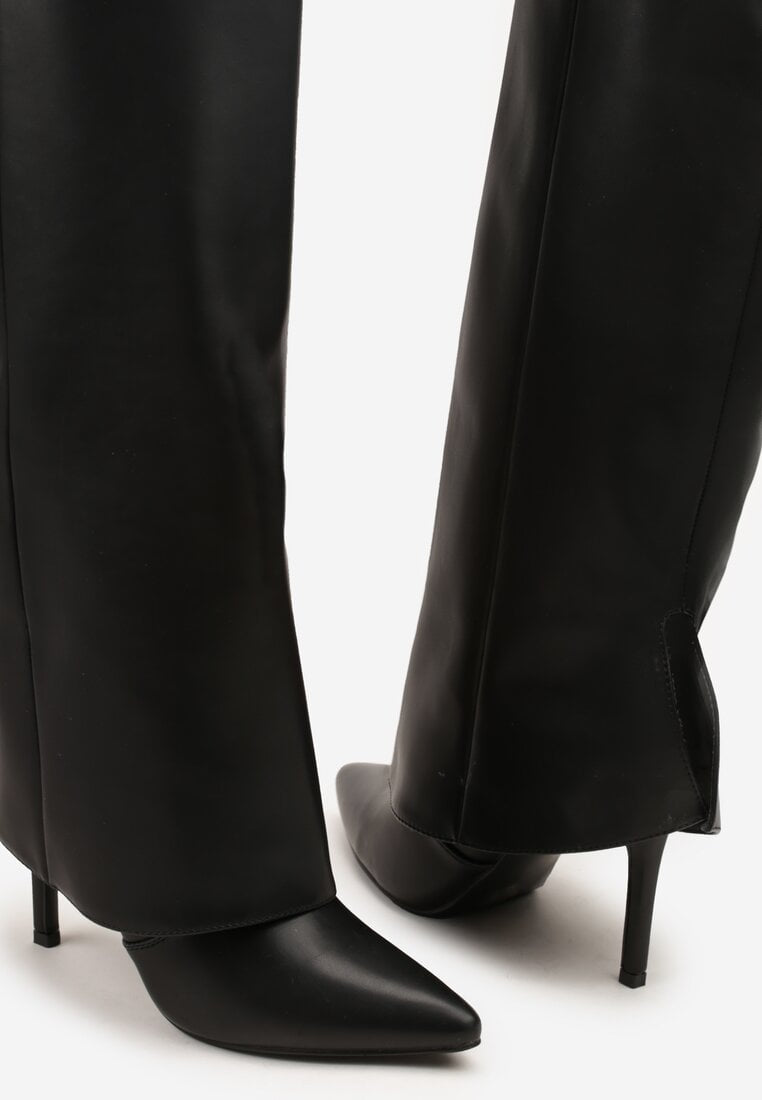 Black folded boots on a thin heel