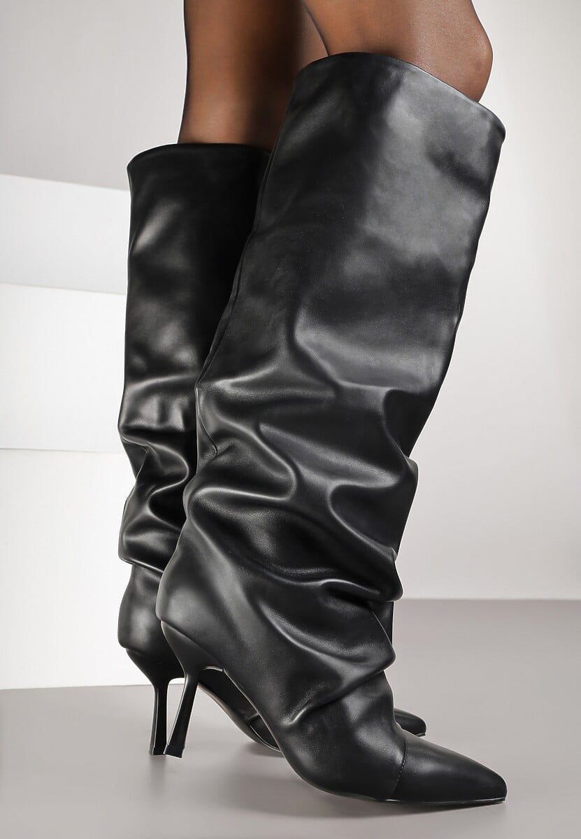 Black pleated boots with a thin heel 