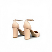 Nude block heel sandals.