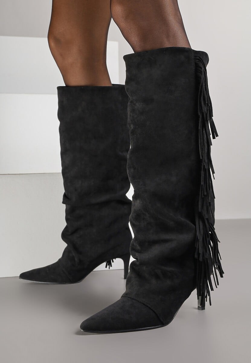 Black boots on a thin heel
