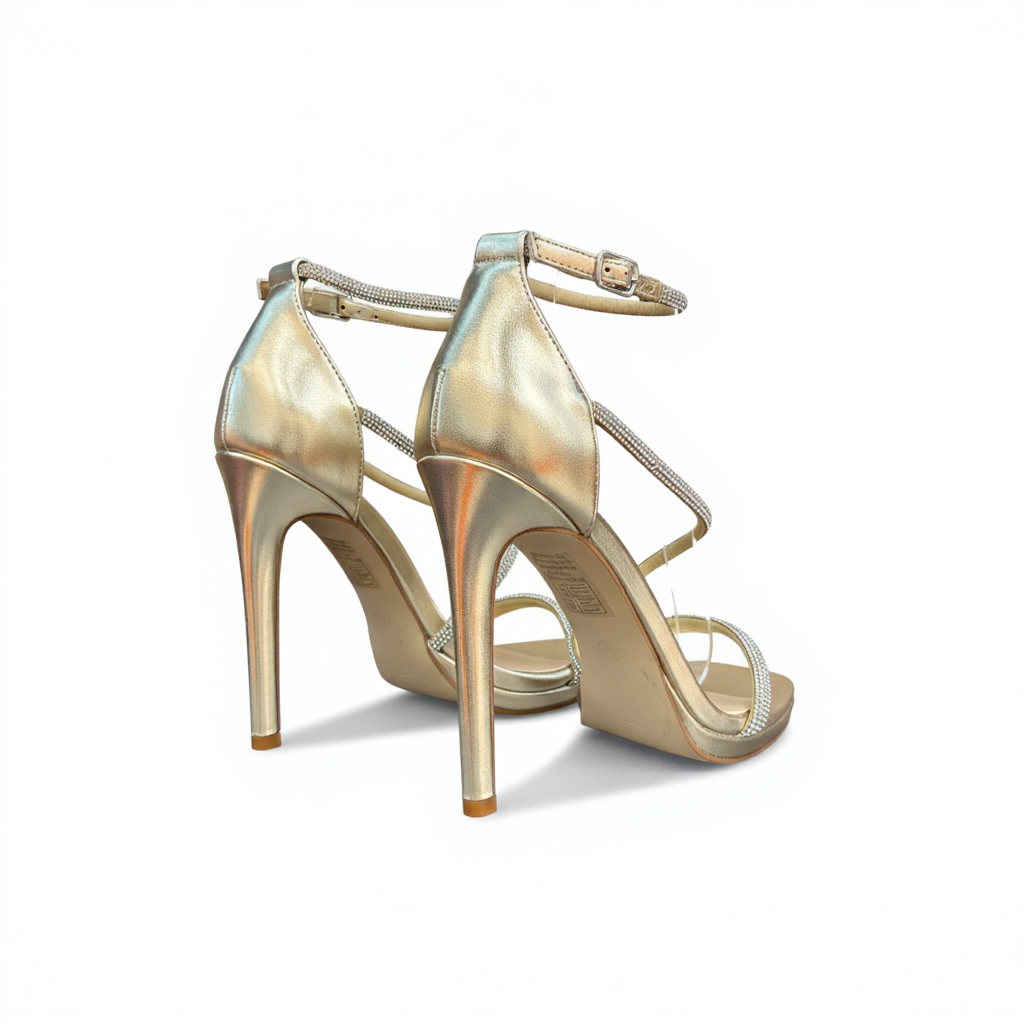 Gold sandals on a thin heel
