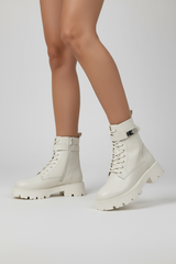 Beige ankle boots with strap