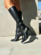 Black boots on a thin heel