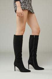 Black polished boots with a thin heel